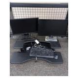 Two Dell computers with keyboard mouse and R