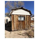 Aprox 6x9 Storage shed on skids Buyer to haul