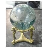 Glass float with brass stand