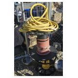 Spools of rope and hose, yellow and red