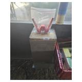 Vintage box with a bottle topper.