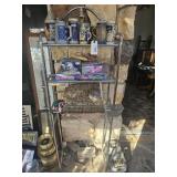 Collection of vintage signs, model cars, shelf,