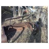 Yard art ski chair ?  bucket?   And Wheels