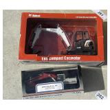 2 Diecast collectible excavators
