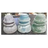 1 Pink & 2 Green Glass Insulators Mineral Coated