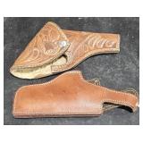 (2) Leather Gun Holsters One Carving w/ Padding