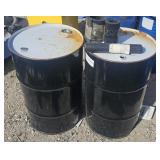 2 black drums/barrels