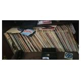 Assortment of vinyl records and everything in the