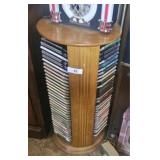 Spinning wooden CD holder with CDs