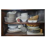 2 shelves of dishes and serving trays