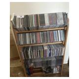 CDS on a wooden shelf