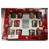 Christmas candles and shot glass