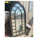 29 1/2x60 wall mirror.      Front by the rolling