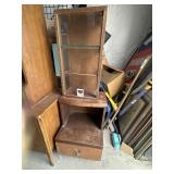 Cabinet with small glass display ontop