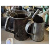 Antique oil cans