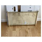 Gold color, bamboo framed mirror
