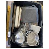 Tote of assorted bakeware and cast-iron