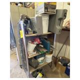 Rolling cart with chains and contents