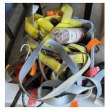 Tub of assorted straps and bungees