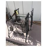 Two metal sewing machine stands