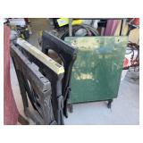 Green table and 3 plastic saw horses