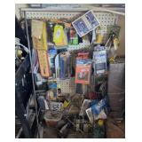 Tack board with miscellaneous supplies