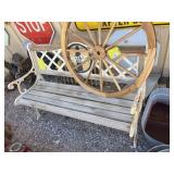 Wagon wheel yard art and Coca Cola bench