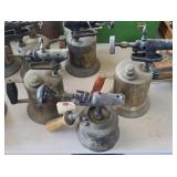 Three antique flow torches