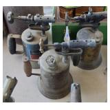 Three vintage blow torches
