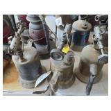 Three antique blow torches