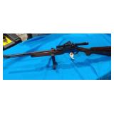 Browning 22 magnum pump action rifle with tasco 4