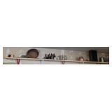 Shelf of miscellaneous antiques, glass bottles,