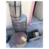 Yard art. Barrel, crate, traps