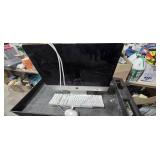 Apple monitor with keyboard amd mouse