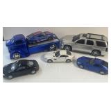 6 Assorted Cars and Hauler as Pictured Plastic