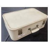 (F). Medium Size Lady Baltimore Suitcase