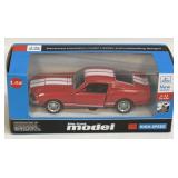 Die Cast Model of a 1965 Shelby Red GT350 NIB