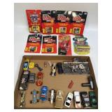 (B)Several Assorted NIB Racing Champions Cars, And