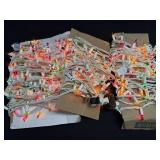 3 Strands Of Colored Christmas Lights On White