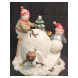 Snowmen Playing On Igloo Figurine