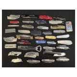 Several Assorted Pocket Knives As Pictured