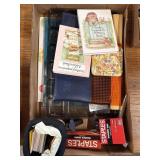 Assorted stationary items including staples,
