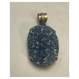 This is a sterling silver titanium druzy agate