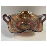 Fenton amethyst carnival glass bonbon dish with a