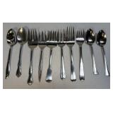 (A) Several Assorted Stainless Serving Utensils As