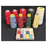 (L) Several Spools of Sewing Thread and Deluxe