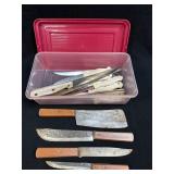 (D) Several Assorted Knives In Plastic Storage