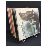 (F) Several Assorted Albums In Stand