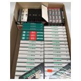 (D) Several Unopened Cassette Tapes and One Case