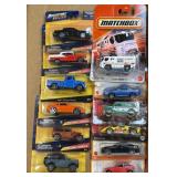 (C) 12 Matchbox and Adventure Force Cars NIB As